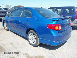 2009 Toyota Corolla with VIN 1NXBU40E49Z022648, listed as a IAAI auction lot 42042633 with 134,628 mi miles. Bid and sale history available at carsss.com. Image 3.