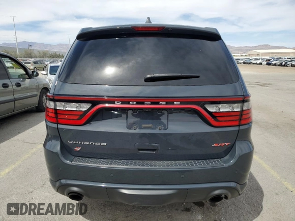 2018 Dodge Durango SRT with VIN 1C4SDJGJ1JC176749, listed as a Copart auction lot 52998575 with 49,234 mi miles and Salvage title. Bid and sale history available at DreamBid. Image 6.