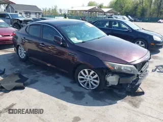 2014 Kia Optima EX z VIN 5XXGN4A7XEG290370, wystawiony jako IAAI lot #42030444 z przebiegiem 165 074 mil mil oraz . Historia ofert i sprzedaży dostępna na DreamBid. Obrazek 1.