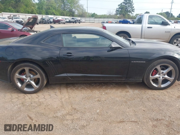 2014 Chevrolet Camaro LT z VIN 2G1FC1E38E9219031, wystawiony jako IAAI lot #41922230 z przebiegiem 135 539 mil mil oraz . Historia ofert i sprzedaży dostępna na DreamBid. Obrazek 13.