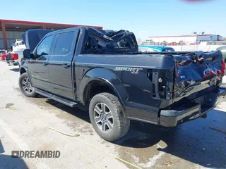 2015 Ford F-150 XLT with VIN 1FTEW1EG8FFA04724, listed as a IAAI auction lot 41884761 with 115,426 mi miles. Bid and sale history available at carsss.com. Image 3.