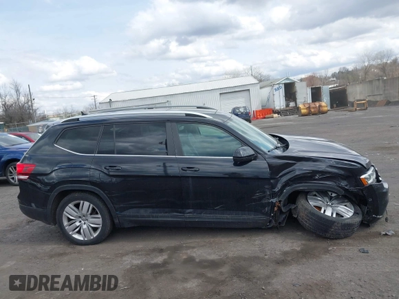 2019 Volkswagen Atlas SE z VIN 1V2UR2CA6KC580992, wystawiony jako IAAI lot #41902265 z przebiegiem 63 233 mil mil oraz . Historia ofert i sprzedaży dostępna na DreamBid. Obrazek 13.