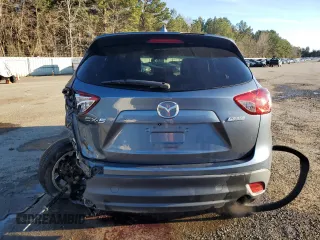 2015 Mazda CX-5 Grand Touring with VIN JM3KE2DY9F0483509, listed as a Copart auction lot 87406944 with 176,213 mi miles and Salvage Title. Bid and sale history available at carsss.com. Image 6.