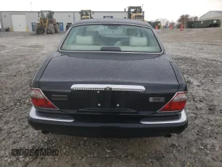 2003 Jaguar XJ Vanden Plas with VIN SAJDA24C33LF52131, listed as a Copart auction lot 84263554 with Not provided miles and Clean title. Bid and sale history available at DreamBid. Image 6.