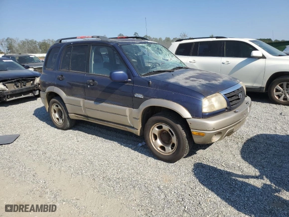 2002 Suzuki Grand Vitara JLX with VIN JS3TD62V424152230, listed as a Copart auction lot 74657294 with 160,135 mi miles and Salvage Title. Bid and sale history available at carsss.com. Image 4.