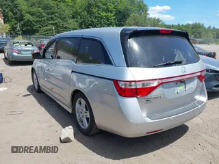 2012 Honda Odyssey Touring with VIN 5FNRL5H9XCB026741, listed as a IAAI auction lot 42808245 with 293,422 mi miles and . Bid and sale history available at DreamBid. Image 3.