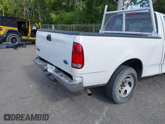 1999 Ford F-150 z VIN 1FTZF1729XKB56992, wystawiony jako IAAI lot #42112335 z przebiegiem 230 061 mil mil oraz . Historia ofert i sprzedaży dostępna na DreamBid. Obrazek 6.