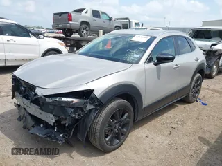 2024 Mazda CX-30 2.5 S Select Sport with VIN 3MVDMBBM6RM694560, listed as a IAAI auction lot 42172660 with 20,608 mi miles. Bid and sale history available at carsss.com. Image 2.