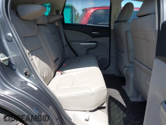 2014 Honda CR-V EX-L with VIN 5J6RM4H79EL077096, listed as a IAAI auction lot 42153513 with 104,972 mi miles and . Bid and sale history available at DreamBid. Image 8.