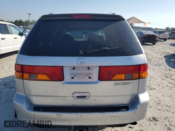 2003 Honda Odyssey EX z VIN 5FNRL18673B014271, wystawiony jako Copart lot #68613374 z przebiegiem 236 360 mil mil oraz Nie do naprawy • Non repairable. Historia ofert i sprzedaży dostępna na DreamBid. Obrazek 6.