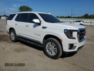 2021 GMC Yukon SLT with VIN 1GKS1BKT0MR425247, listed as a Copart auction lot 69205584 with 72,952 mi miles and Salvage Title. Bid and sale history available at carsss.com. Image 4.