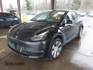 2023 Tesla Model Y Long Range with VIN 7SAYGAEE7PF739924, listed as a IAAI auction lot 41612323 with 75,226 mi miles and . Bid and sale history available at DreamBid. Image 16.