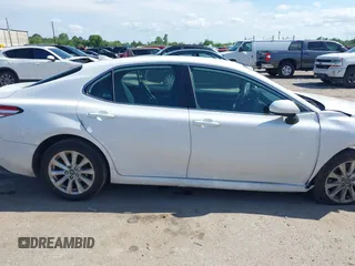 2019 Toyota Camry LE with VIN 4T1B11HK4KU180995, listed as a IAAI auction lot 42088737 with 133,813 mi miles and . Bid and sale history available at DreamBid. Image 14.