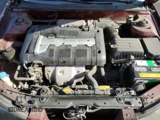 2001 Hyundai Elantra GLS z VIN KMHDN45D41U107399, wystawiony jako Copart lot #52658745 z przebiegiem 65 459 mil mil oraz Szkoda całkowita • Salvage title. Historia ofert i sprzedaży dostępna na DreamBid. Obrazek 11.