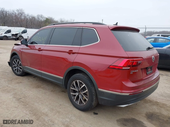 2020 Volkswagen Tiguan SE with VIN 3VV2B7AX2LM018722, listed as a IAAI auction lot 41802291 with 58,914 mi miles. Bid and sale history available at carsss.com. Image 3.