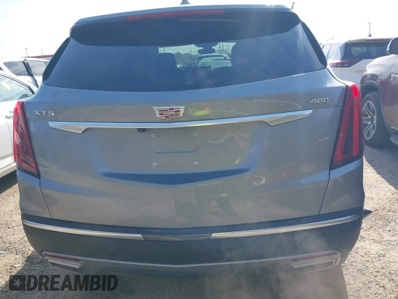 2025 Cadillac XT5 FWD Premium Luxury with VIN 1GYKNCRS1SZ120351, listed as a IAAI auction lot 41334881 with 4,915 mi miles. Bid and sale history available at carsss.com. Image 16.