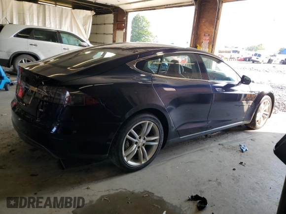 2014 Tesla Model S 60 with VIN 5YJSA1H16EFP43523, listed as a Copart auction lot 63291145 with Not provided miles and Clean title. Bid and sale history available at DreamBid. Image 3.