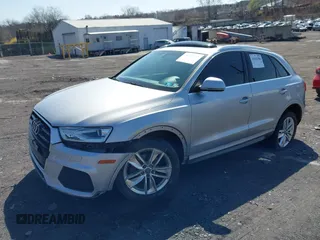 2016 Audi Q3 Premium Plus with VIN WA1EFCFS1GR016996, listed as a IAAI auction lot 41942380 with 90,852 mi miles and . Bid and sale history available at DreamBid. Image 2.