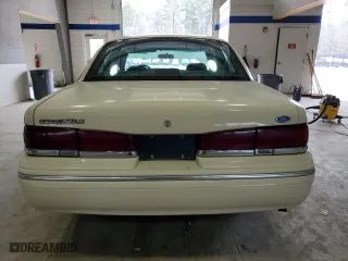 1996 Ford Crown Victoria LX with VIN 2FALP74W1TX152476, listed as a Copart auction lot 47946925 with 131,008 mi miles and Salvage Title. Bid and sale history available at carsss.com. Image 6.