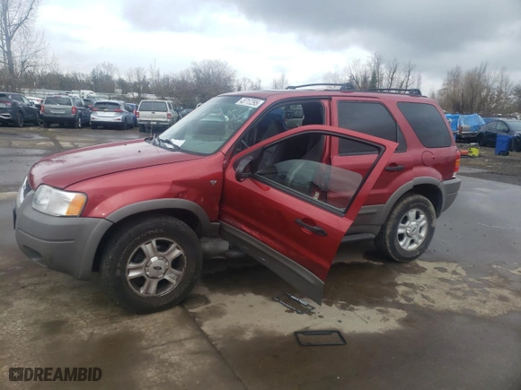 2001 Ford Escape XLT with VIN 1FMCU04101KA36194, listed as a Copart auction lot 43717295 with 72,265 mi miles and Salvage Title. Bid and sale history available at carsss.com. Image 1.