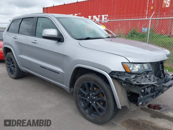 2017 Jeep Grand Cherokee Laredo with VIN 1C4RJFAG1HC701921, listed as a IAAI auction lot 42164963 with 135,039 mi miles and . Bid and sale history available at DreamBid. Image 1.