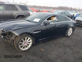 2014 Jaguar XJ with VIN SAJWA1CZXE8V74400, listed as a IAAI auction lot 38250698 with 102,205 mi miles and . Bid and sale history available at DreamBid. Image 18.