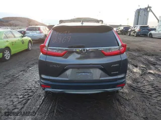 2017 Honda CR-V Touring with VIN 2HKRW2H94HH617081, listed as a IAAI auction lot 41294254 with 145,140 mi miles. Bid and sale history available at carsss.com. Image 16.