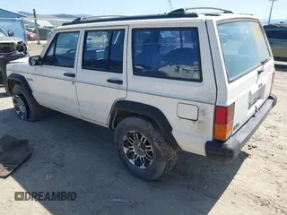 1996 Jeep Cherokee SE with VIN 1J4FT28S7TL307603, listed as a IAAI auction lot 42087278 with 141,994 mi miles. Bid and sale history available at carsss.com. Image 3.