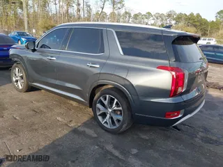 2021 Hyundai Palisade Limited with VIN KM8R54HE2MU257106, listed as a IAAI auction lot 41790977 with 64,777 mi miles. Bid and sale history available at carsss.com. Image 3.