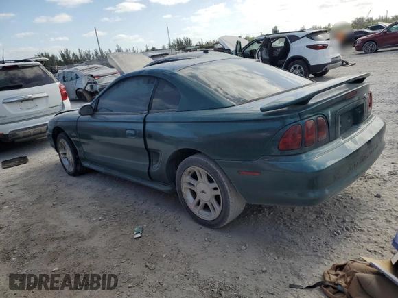 1998 Ford Mustang GT z VIN 1FAFP42X0WF255816, wystawiony jako Copart lot #55011425 z przebiegiem 144 397 mil mil oraz Czysty tytuł • Clean title. Historia ofert i sprzedaży dostępna na DreamBid. Obrazek 2.