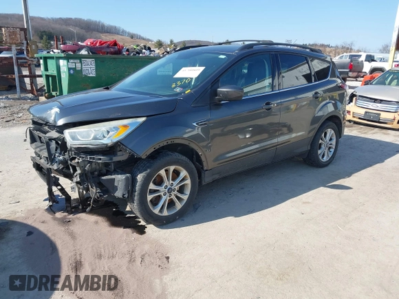 2017 Ford Escape SE with VIN 1FMCU9G99HUD03370, listed as a IAAI auction lot 41700809 with 136,575 mi miles. Bid and sale history available at carsss.com. Image 2.