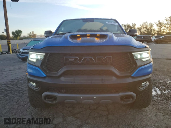 2021 Ram 1500 TRX with VIN 1C6SRFU98MN757772, listed as a Copart auction lot 49923465 with 27,250 mi miles and Salvage Title. Bid and sale history available at carsss.com. Image 5.