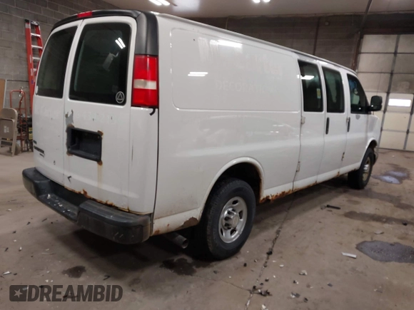 2012 Chevrolet Express Cargo Van with VIN 1GCWGGBA0C1100411, listed as a IAAI auction lot 41024219 with 197,251 mi miles. Bid and sale history available at carsss.com. Image 4.