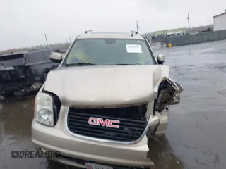 2007 GMC Yukon SLT z VIN 1GKFK13037J282696, wystawiony jako IAAI lot #41996538 z przebiegiem 143 607 mil mil oraz . Historia ofert i sprzedaży dostępna na DreamBid. Obrazek 12.