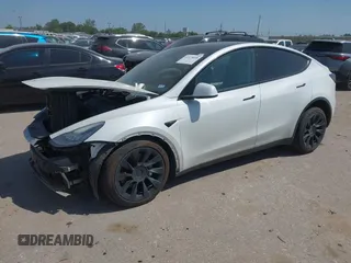 2021 Tesla Model Y Long Range with VIN 5YJYGDEE0MF265339, listed as a IAAI auction lot 41975058 with 51,292 mi miles and . Bid and sale history available at DreamBid. Image 19.