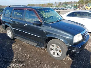 2003 Suzuki XL7 Touring z VIN JS3TX92VX34114687, wystawiony jako IAAI lot #40988145 z przebiegiem Nie podano mil oraz . Historia ofert i sprzedaży dostępna na DreamBid. Obrazek 6.
