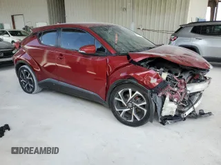 2018 Toyota C-HR XLE z VIN NMTKHMBX9JR049147, wystawiony jako Copart lot #57216905 z przebiegiem 139 352 mil mil oraz Czysty tytuł • Clean title. Historia ofert i sprzedaży dostępna na DreamBid. Obrazek 4.