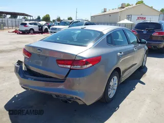 2016 Kia Optima LX with VIN 5XXGT4L36GG098804, listed as a IAAI auction lot 42772231 with 206,471 mi miles and . Bid and sale history available at DreamBid. Image 4.