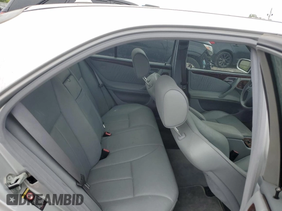 2000 Mercedes-Benz E 320 with VIN WDBJF65J1YB099417, listed as a Copart auction lot 54656915 with 130,387 mi miles and Salvage Title. Bid and sale history available at DreamBid. Image 10.