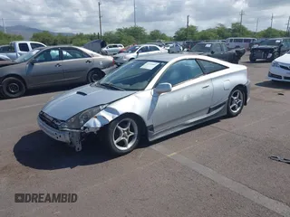 2000 Toyota Celica GT z VIN JTDDR32T4Y0065557, wystawiony jako IAAI lot #41916489 z przebiegiem 180 923 mil mil oraz . Historia ofert i sprzedaży dostępna na DreamBid. Obrazek 2.