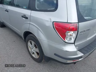 2010 Subaru Forester X with VIN JF2SH6BC0AH788214, listed as a IAAI auction lot 42572954 with 185,564 mi miles and . Bid and sale history available at DreamBid. Image 6.
