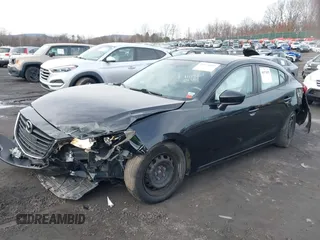 2015 Mazda 3 i SV with VIN JM1BM1T79F1237259, listed as a IAAI auction lot 40971092 with 140,871 mi miles. Bid and sale history available at carsss.com. Image 2.