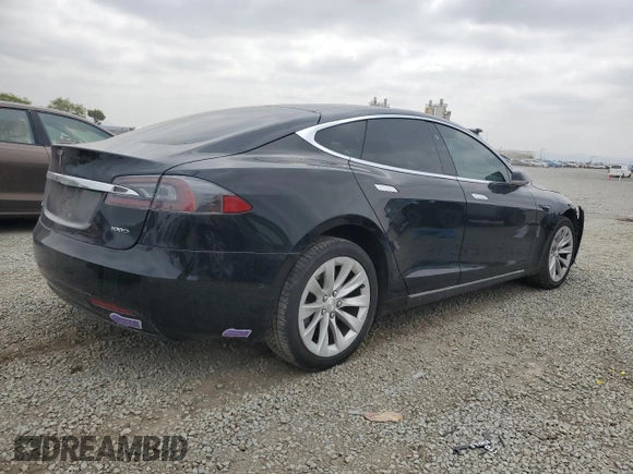 2019 Tesla Model S 75D with VIN 5YJSA1E25KF299740, listed as a Copart auction lot 55821595 with 140,385 mi miles and Salvage title. Bid and sale history available at DreamBid. Image 3.