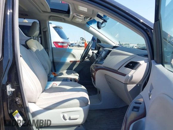 2014 Toyota Sienna XLE with VIN 5TDYK3DC2ES492554, listed as a IAAI auction lot 41685109 with 196,619 mi miles and . Bid and sale history available at DreamBid. Image 5.