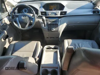 2013 Honda Odyssey Touring with VIN 5FNRL5H90DB003003, listed as a Copart auction lot 58519345 with 259,383 mi miles and Salvage title. Bid and sale history available at DreamBid. Image 8.