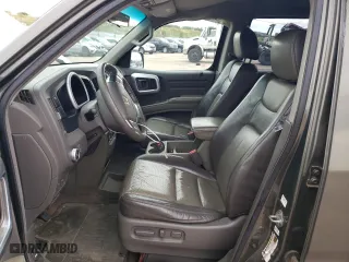 2006 Honda Ridgeline RTL with VIN 2HJYK16536H530632, listed as a Copart auction lot 65947994 with 186,655 mi miles and Salvage Title. Bid and sale history available at carsss.com. Image 7.