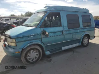 1995 GMC Safari z VIN 1GDDM19W2SB525888, wystawiony jako Copart lot #81358954 z przebiegiem 121 066 mil mil oraz Szkody całkowita. Historia ofert i sprzedaży dostępna na DreamBid. Obrazek 1.