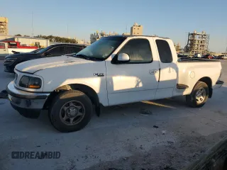 1998 Ford F-150 XL with VIN 1FTZX0722WKB37738, listed as a Copart auction lot 75958994 with 96,675 mi miles and Salvage title. Bid and sale history available at DreamBid. Image 1.