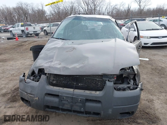 2004 Ford Escape XLT with VIN 1FMCU93104KA88855, listed as a IAAI auction lot 41433173 with 136,355 mi miles and . Bid and sale history available at DreamBid. Image 13.