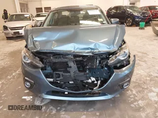 2014 Mazda 3 S Grand Touring with VIN JM1BM1W31E1182703, listed as a IAAI auction lot 41470742 with 123,956 mi miles and . Bid and sale history available at DreamBid. Image 12.